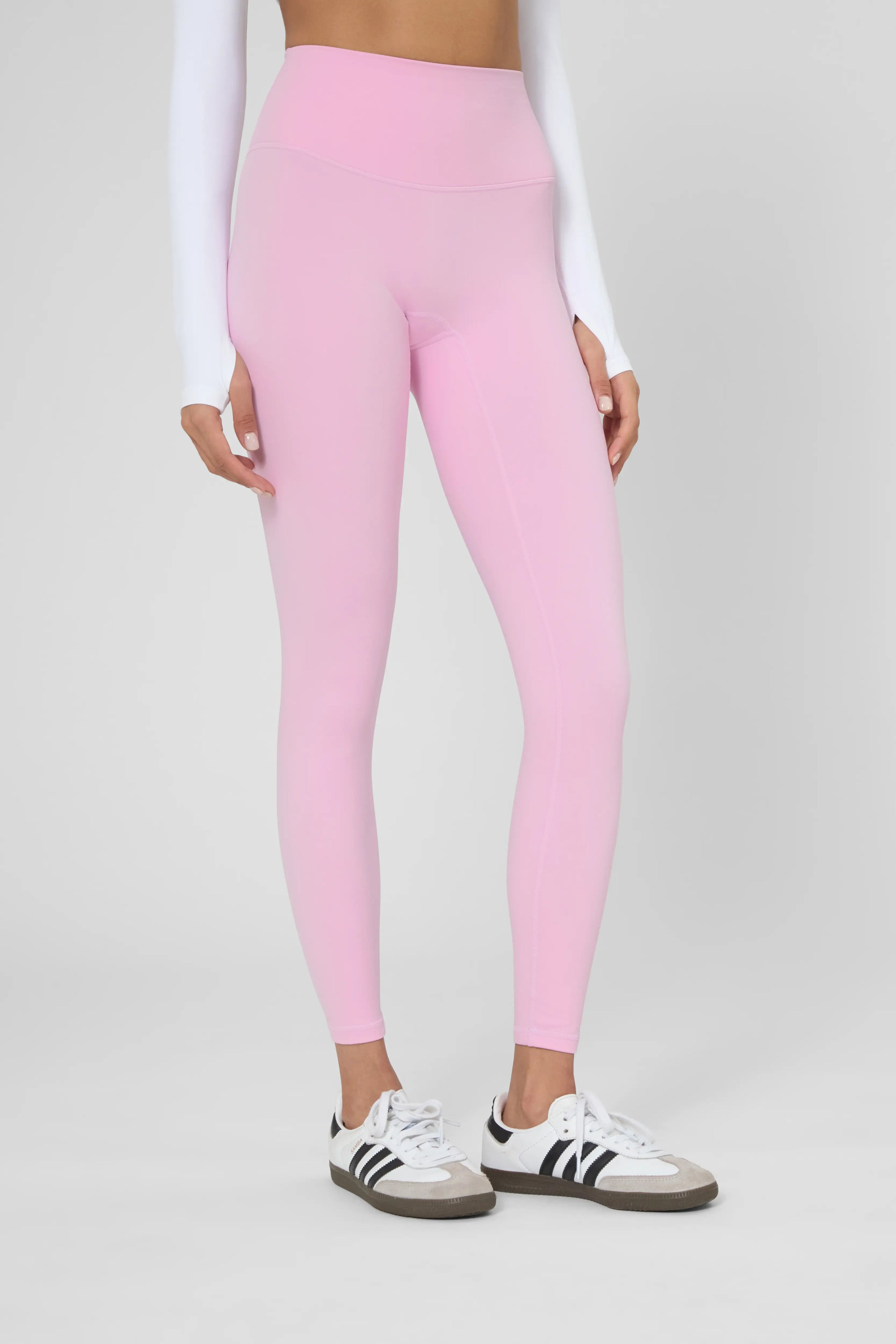 Утеплені базові легінси з начосом рожевого кольору