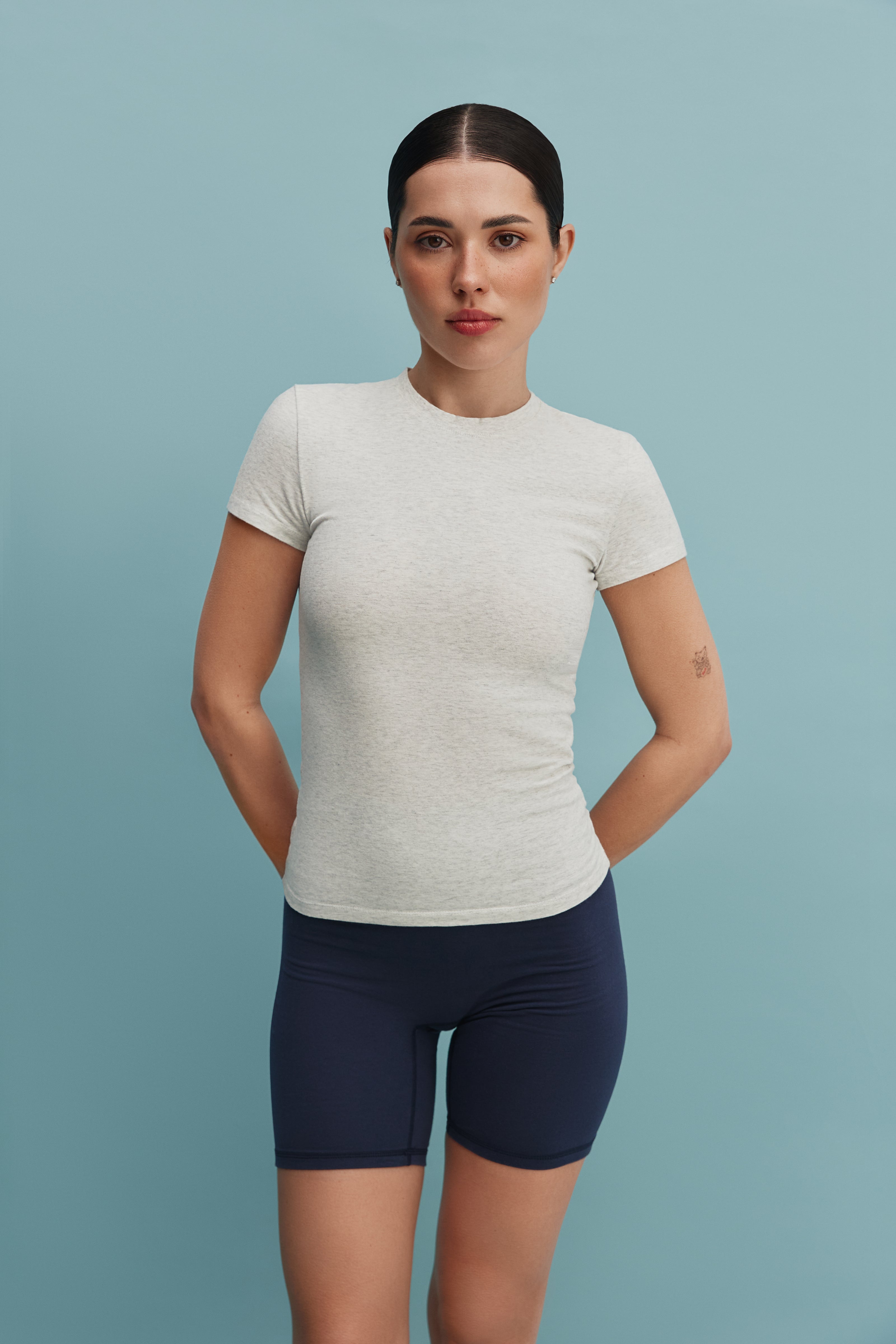 Футболка бавовняна облягаюча світлий меланж