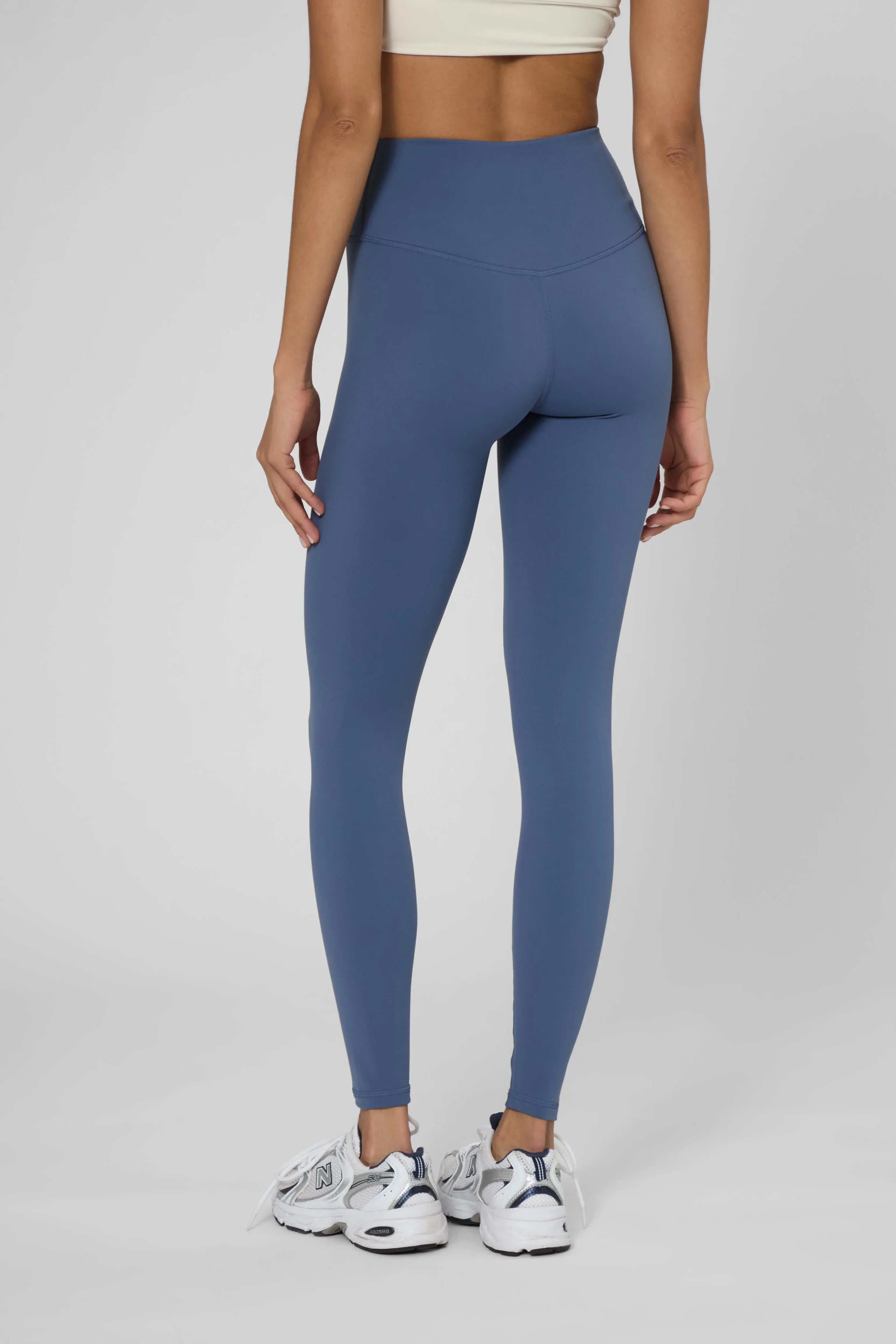 Утеплені базові легінси з начосом синього кольору